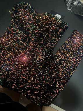 Fashion Nova Black Multicolor Sequin Jumpsuit stretches